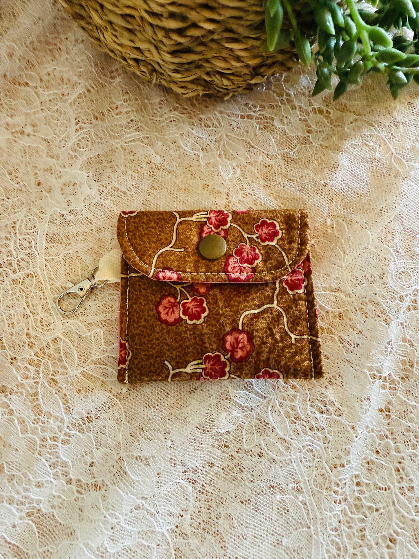 Earbud Holder with Clasp