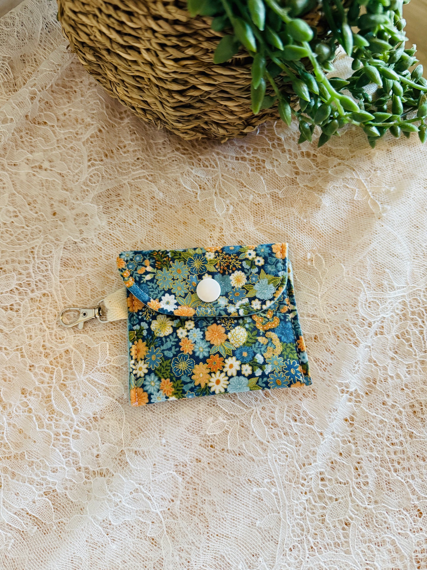 Earbud Holder with Clasp